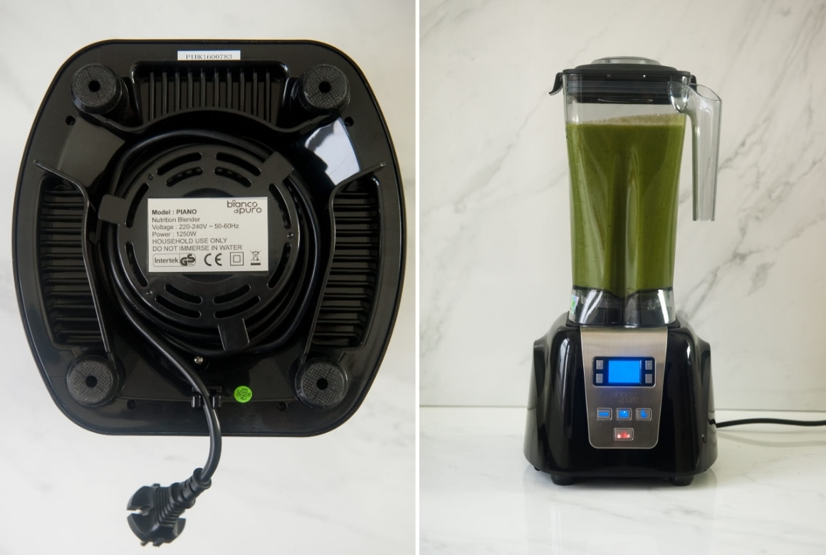 Bianco Piano Kabelaufwicklung und mit Grünem Smoothie befüllter Mixer